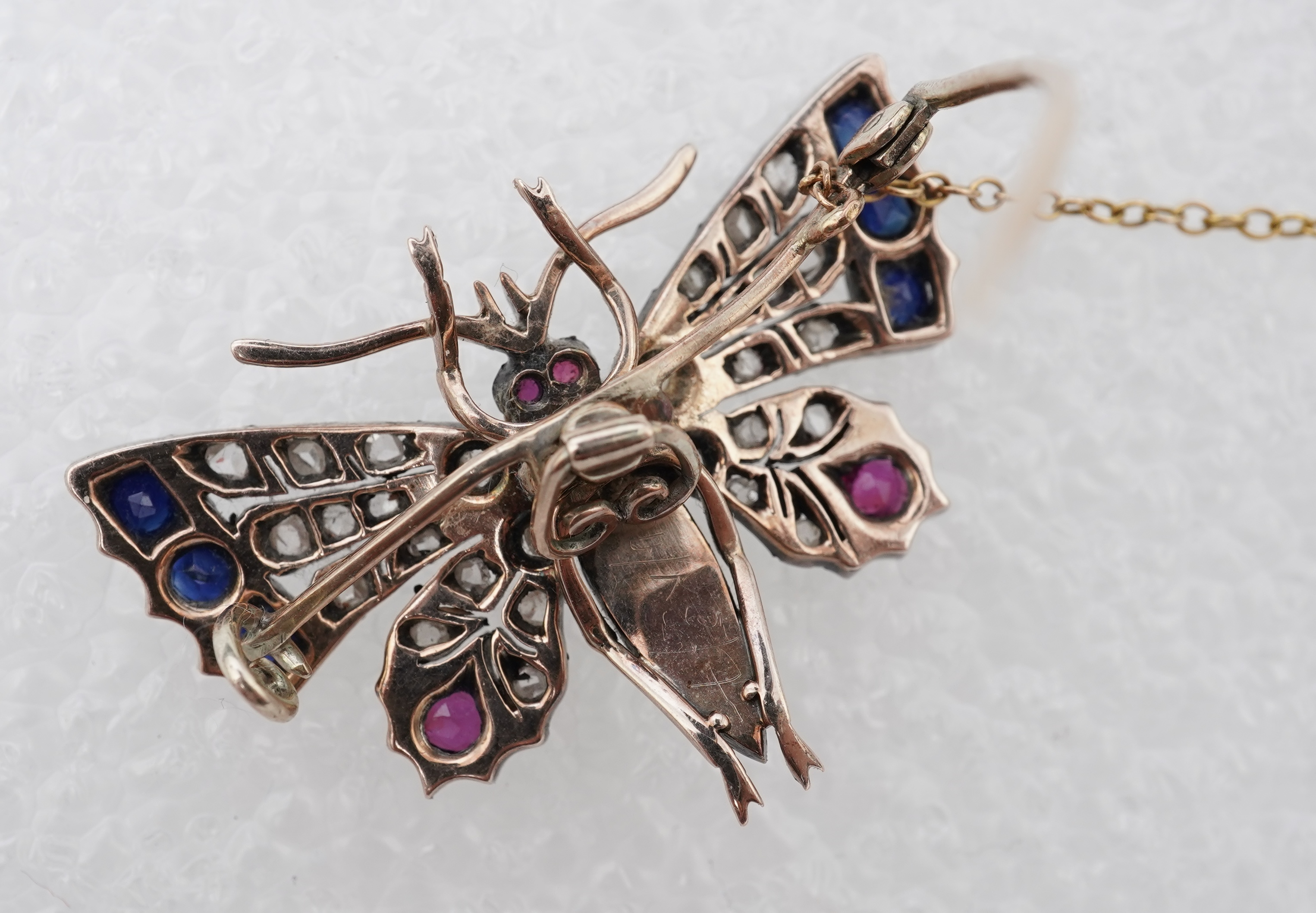 A Victorian ruby, sapphire, pearl and diamond brooch, late 19th century